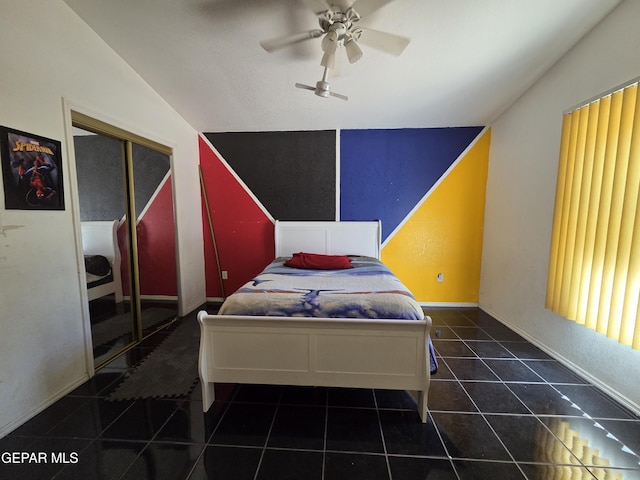 306 SW A St SW, Fabens, TX 79838 - bedroom with baseboards, a ceiling fan, tile patterned floors, and vaulted ceiling