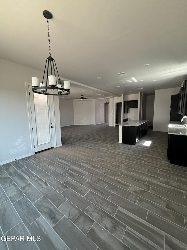 321 Merced Ct, El Paso, TX 79932 - interior space featuring ceiling fan with notable chandelier