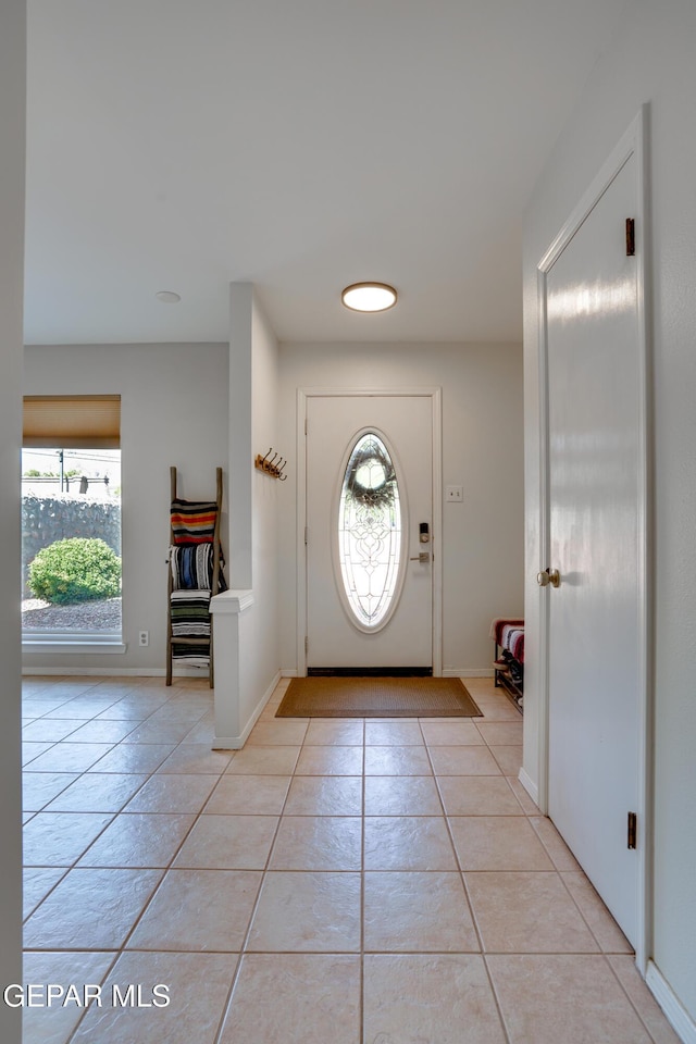 98 Northwind Dr, El Paso, TX 79912 - entrance foyer featuring light tile patterned flooring and baseboards