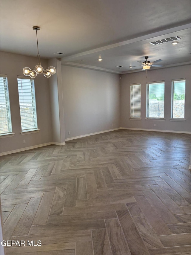 spare room with baseboards, a ceiling fan, a chandelier, and recessed lighting