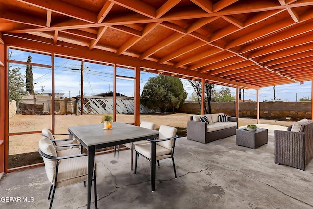 view of patio / terrace with outdoor lounge area, outdoor dining area, and a fenced backyard