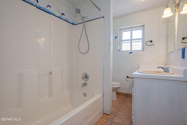 219 Dolan St, El Paso, TX 79905 - bathroom featuring bathtub / shower combination, toilet, tile patterned flooring, and vanity