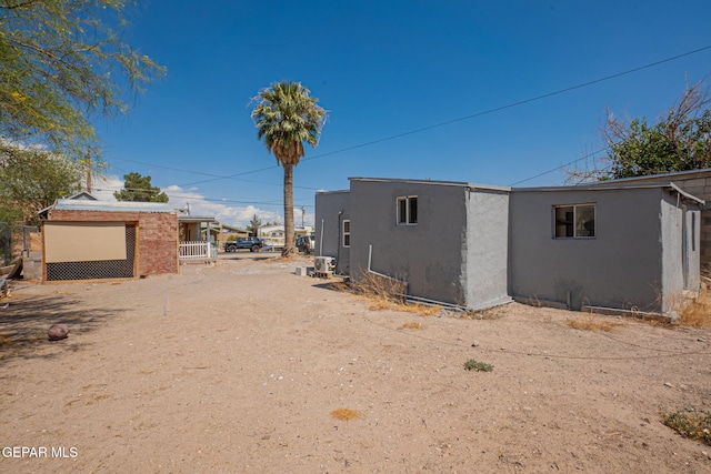 219 Dolan St, El Paso, TX 79905 - view of side of home with stucco siding