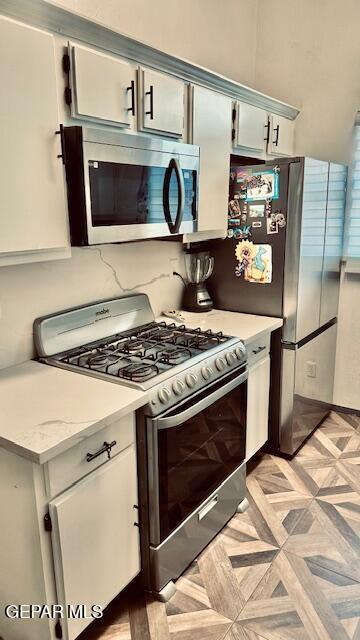 11772 Corona Crest Ave, El Paso, TX 79936 - kitchen with appliances with stainless steel finishes