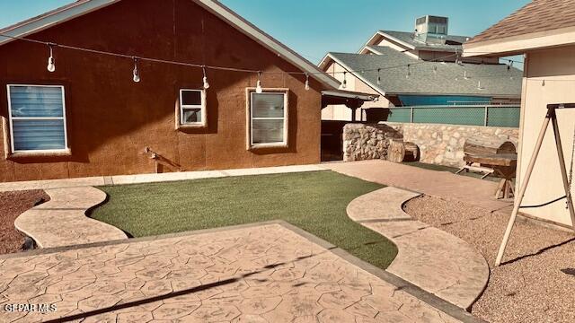 11772 Corona Crest Ave, El Paso, TX 79936 - rear view of property featuring a patio, fence, central air condition unit, and stucco siding