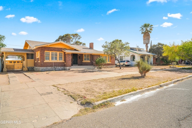 3020 Wheeling Ave, El Paso, TX 79930 - single story home with brick siding, a chimney, and driveway
