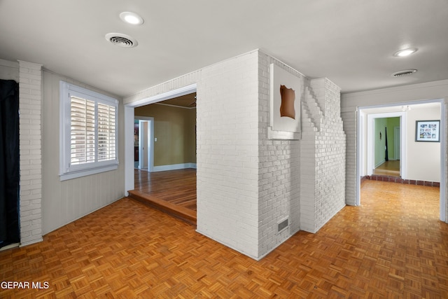 3020 Wheeling Ave, El Paso, TX 79930 - hallway with brick wall and recessed lighting