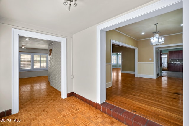 3020 Wheeling Ave, El Paso, TX 79930 - hall featuring a chandelier, baseboards, and healthy amount of natural light