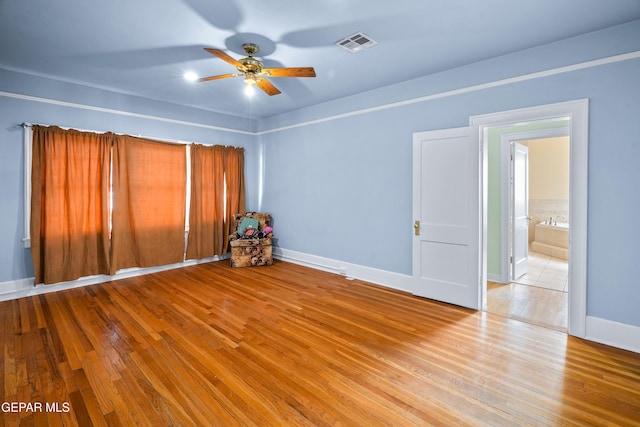 3020 Wheeling Ave, El Paso, TX 79930 - empty room with a ceiling fan, wood finished floors, and baseboards