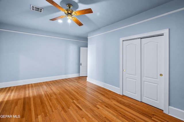 3020 Wheeling Ave, El Paso, TX 79930 - unfurnished bedroom featuring wood finished floors, baseboards, a closet, and ceiling fan
