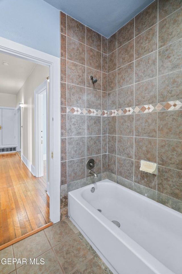 3020 Wheeling Ave, El Paso, TX 79930 - full bathroom with shower / bath combination, tile patterned floors, and baseboards