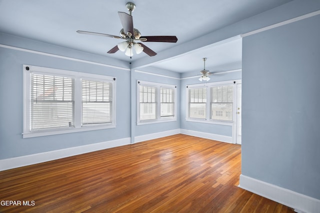 3020 Wheeling Ave, El Paso, TX 79930 - empty room featuring ceiling fan, baseboards, and wood finished floors