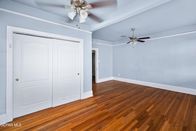 3020 Wheeling Ave, El Paso, TX 79930 - unfurnished bedroom featuring wood finished floors, a closet, baseboards, and ceiling fan