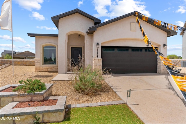 777 Cedarwood Dr, El Paso, TX 79928 - mediterranean / spanish home with an attached garage, driveway, and stucco siding