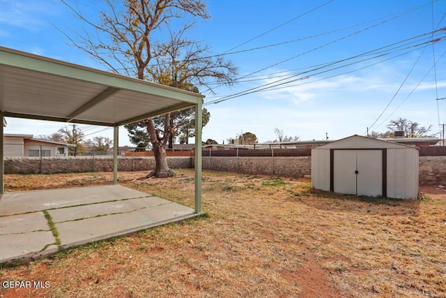 fenced backyard with a patio