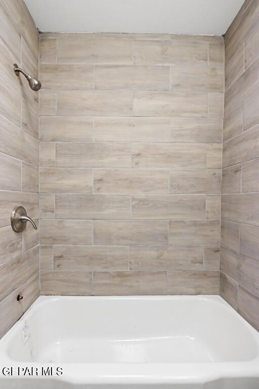 full bathroom featuring shower / bathtub combination