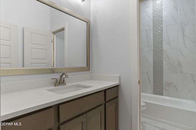 full bathroom featuring vanity, toilet, shower / tub combination, and marble finish floor