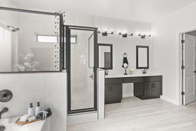 13352 Eton Ct, El Paso, TX 79928 - bathroom featuring a stall shower and double vanity