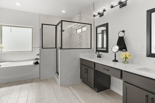 13352 Eton Ct, El Paso, TX 79928 - bathroom featuring a garden tub, a shower stall, and double vanity