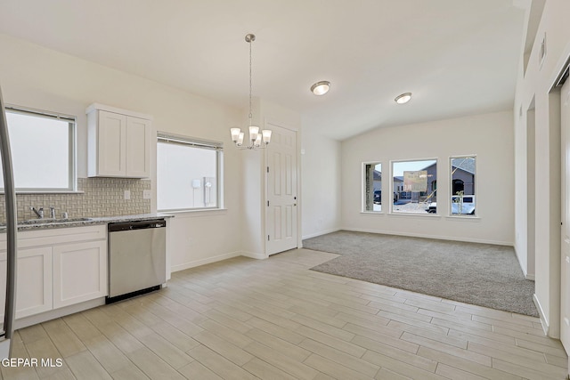 14296 Chris Zingo Ln, El Paso, TX 79928 - kitchen featuring stainless steel dishwasher, a notable chandelier, and a healthy amount of sunlight