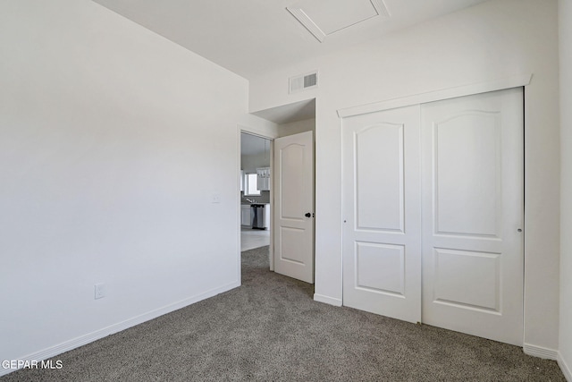 14296 Chris Zingo Ln, El Paso, TX 79928 - unfurnished bedroom featuring baseboards, carpet floors, a closet, and visible vents