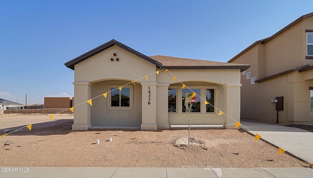 14296 Chris Zingo Ln, El Paso, TX 79928 - view of front facade featuring stucco siding