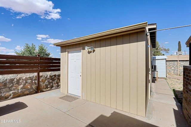 view of shed featuring a fenced backyard