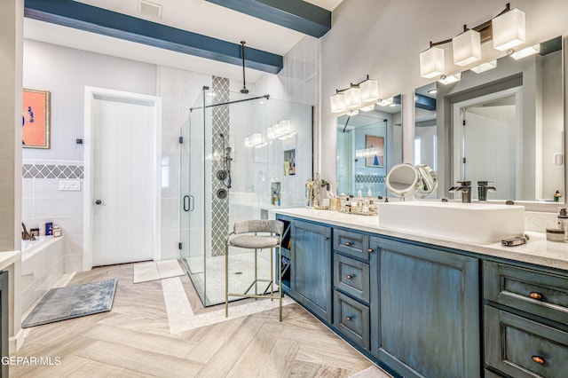 full bathroom featuring a shower stall, tile walls, vanity, and a bath