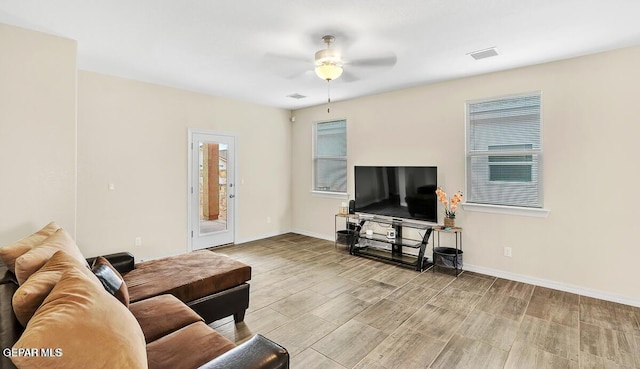 14920 Tierra Fortaleza Ave, El Paso, TX 79938 - living room featuring light wood-style floors, visible vents, baseboards, and ceiling fan