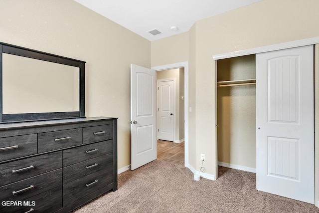 14920 Tierra Fortaleza Ave, El Paso, TX 79938 - unfurnished bedroom with light colored carpet, a closet, baseboards, and visible vents