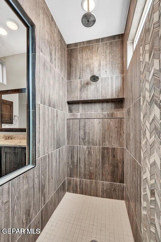 14920 Tierra Fortaleza Ave, El Paso, TX 79938 - full bathroom with a tile shower