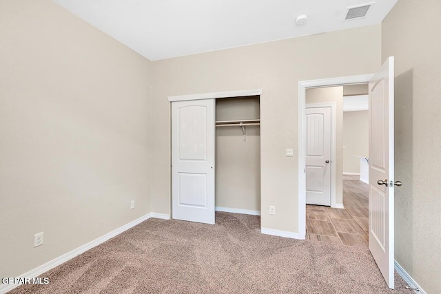 14920 Tierra Fortaleza Ave, El Paso, TX 79938 - unfurnished bedroom featuring baseboards, carpet flooring, a closet, and visible vents