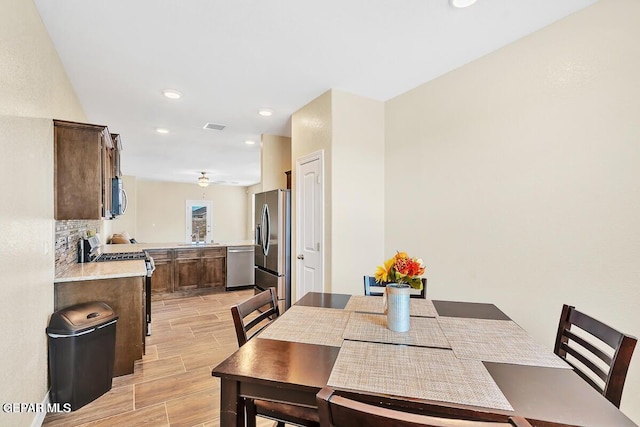 14920 Tierra Fortaleza Ave, El Paso, TX 79938 - dining room featuring wood tiled floor, visible vents, and recessed lighting
