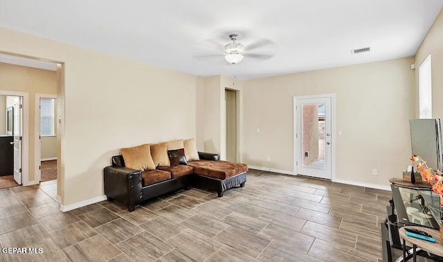 14920 Tierra Fortaleza Ave, El Paso, TX 79938 - living area with wood tiled floor, baseboards, a ceiling fan, and visible vents