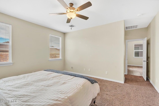 14920 Tierra Fortaleza Ave, El Paso, TX 79938 - carpeted bedroom with baseboards, a ceiling fan, and visible vents
