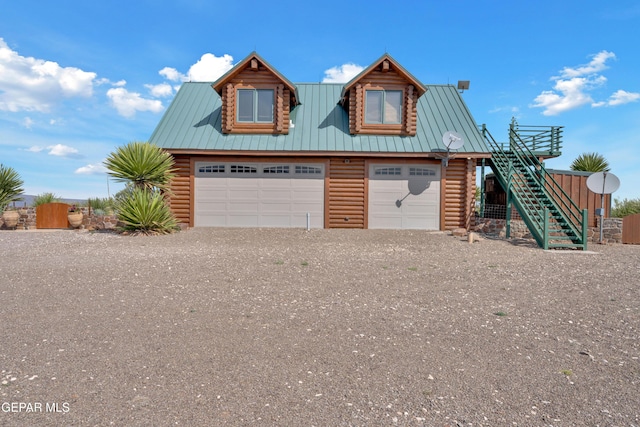 2 Scenic Ridge Rd N, Alpine, TX 99999 - view of front of property featuring log siding, stairway, dirt driveway, and metal roof
