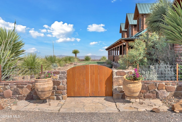2 Scenic Ridge Rd N, Alpine, TX 99999 - view of patio / terrace with a gate and fence