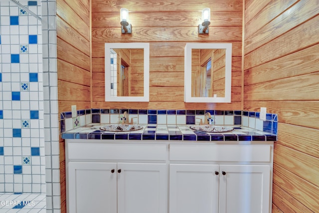 2 Scenic Ridge Rd N, Alpine, TX 99999 - full bath featuring double vanity and wood walls