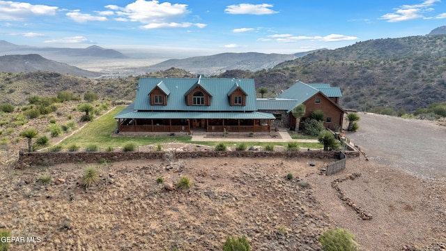 2 Scenic Ridge Rd N, Alpine, TX 99999 - view of front of property with a mountain view, metal roof, and a porch