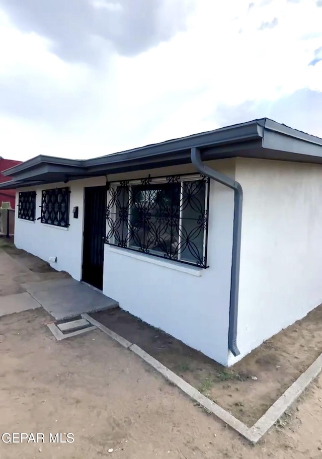 45 S Boone St, El Paso, TX 79905 - view of home's exterior featuring stucco siding