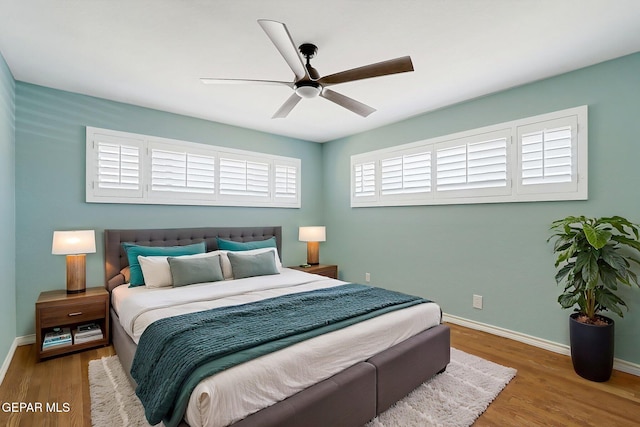 4731 Leeds Ave, El Paso, TX 79903 - bedroom with ceiling fan, baseboards, and wood finished floors