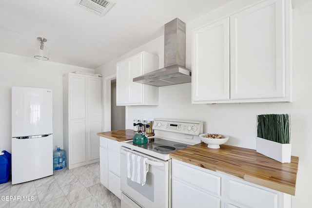 4731 Leeds Ave, El Paso, TX 79903 - kitchen with white appliances, wall chimney exhaust hood, visible vents, butcher block countertops, and marble finish floor