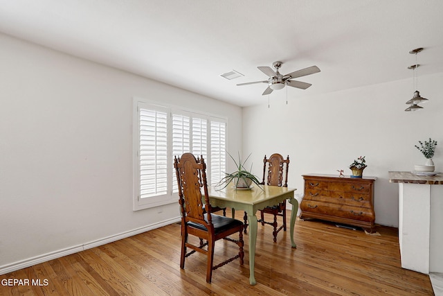 4731 Leeds Ave, El Paso, TX 79903 - dining area with light wood-type flooring, baseboards, visible vents, and a ceiling fan