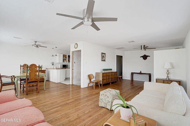 4731 Leeds Ave, El Paso, TX 79903 - living room with visible vents, wood finished floors, and ceiling fan