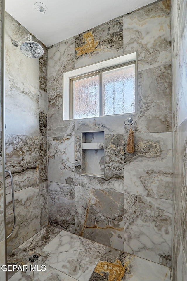4731 Leeds Ave, El Paso, TX 79903 - bathroom featuring a tile shower
