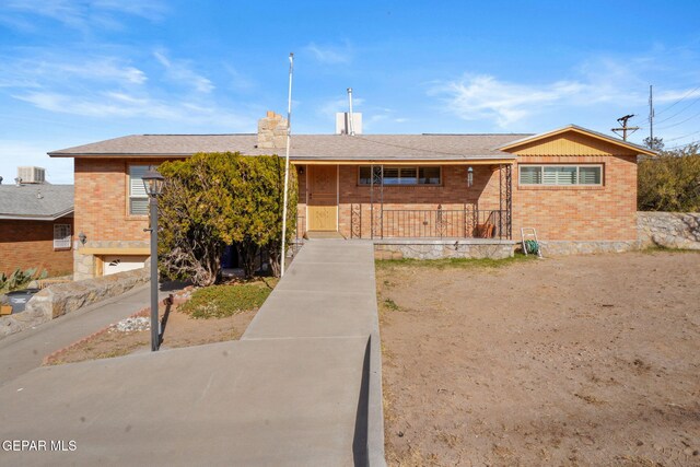 4731 Leeds Ave, El Paso, TX 79903 - view of front of house featuring a porch and brick siding
