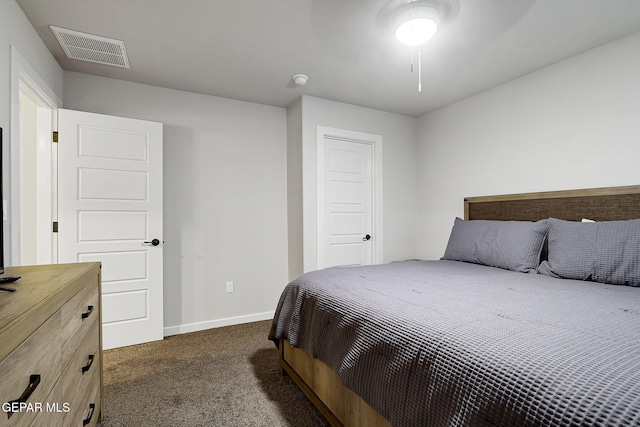 7809 Enchanted Circle Dr, El Paso, TX 79911 - bedroom with dark colored carpet and baseboards