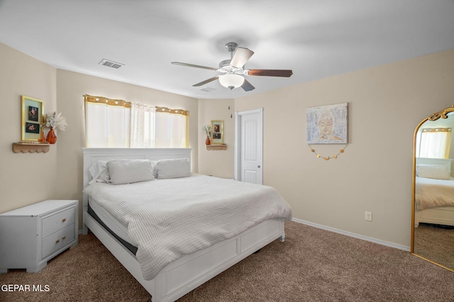 bedroom with carpet, visible vents, baseboards, and a ceiling fan