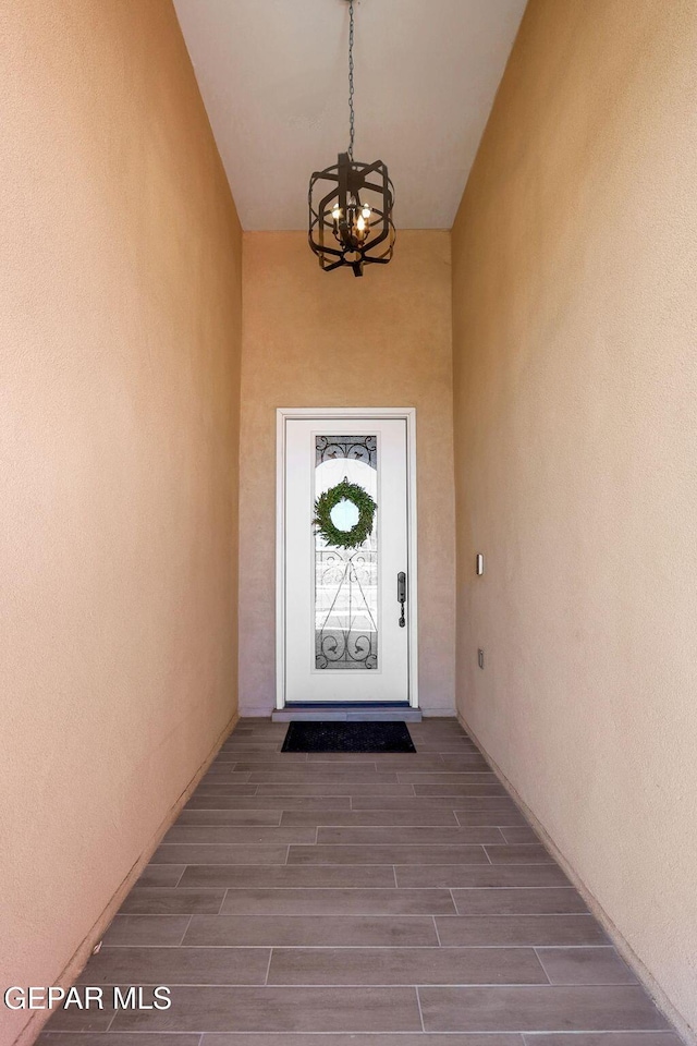 property entrance with stucco siding