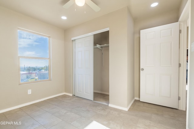 unfurnished bedroom featuring baseboards, a closet, recessed lighting, and a ceiling fan